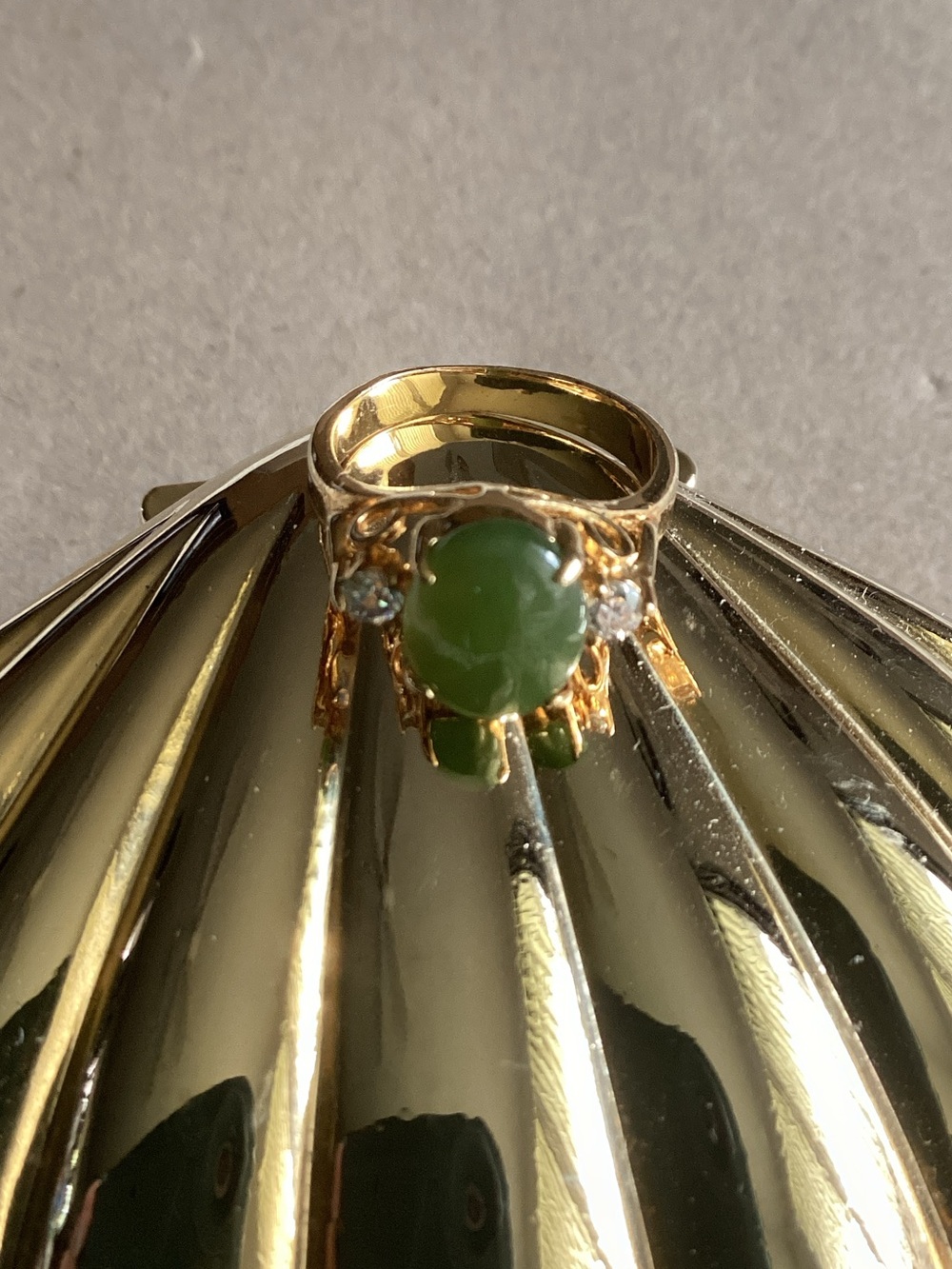 Gold-Plated Ring with Green Jade Cabochon and Clear Accents